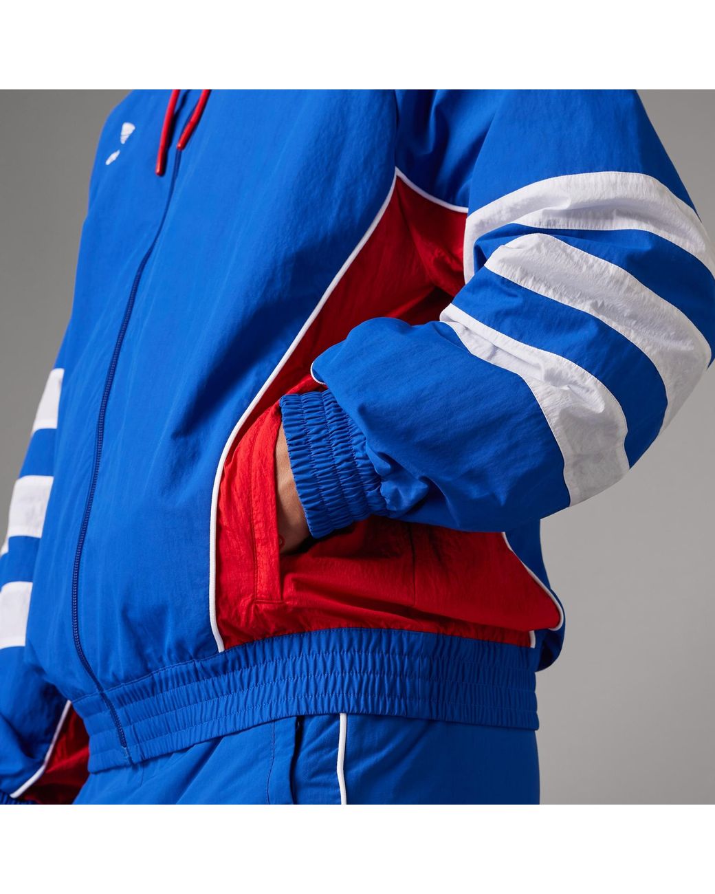 Adidas blue and shop red tracksuit