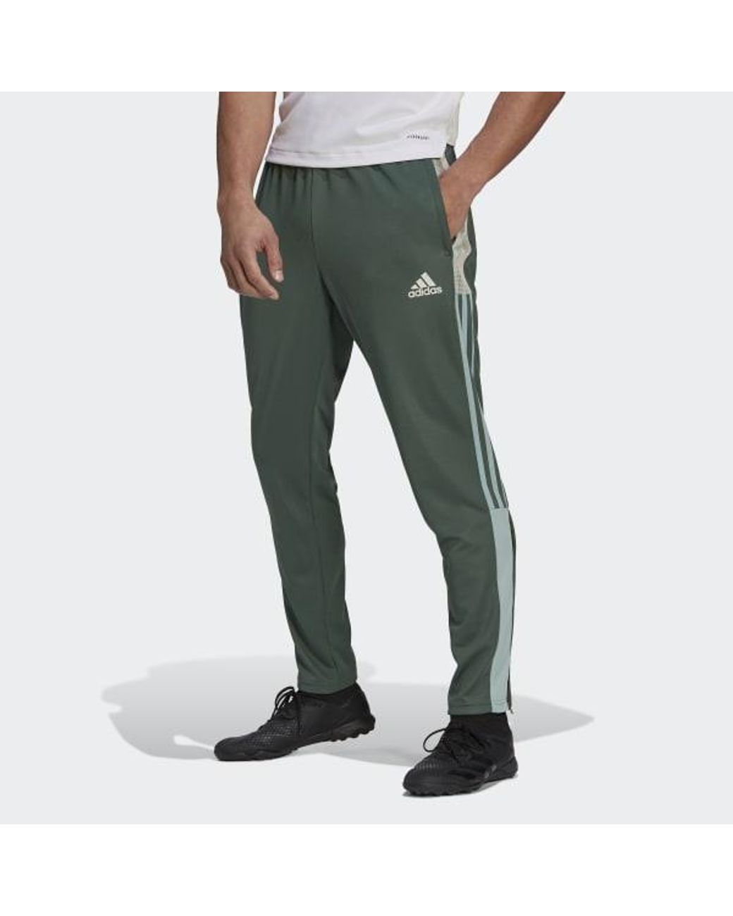 men's green track pants with red stripe