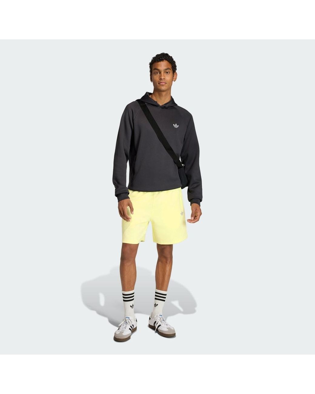 Adidas Yellow Trefoil Essentials Spacer Shorts for men