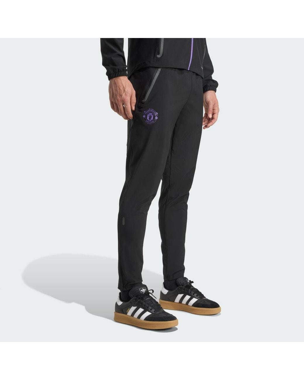 Adidas Black Manchester United Tiro 25 Competition Vis Tech Travel Pants for men