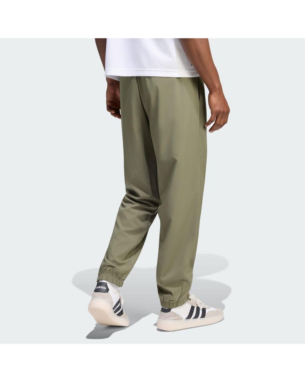 Adidas Green Essentials Small Logo Stanford Lite Woven Tapered Cuffed Tracksuit Bottoms for men
