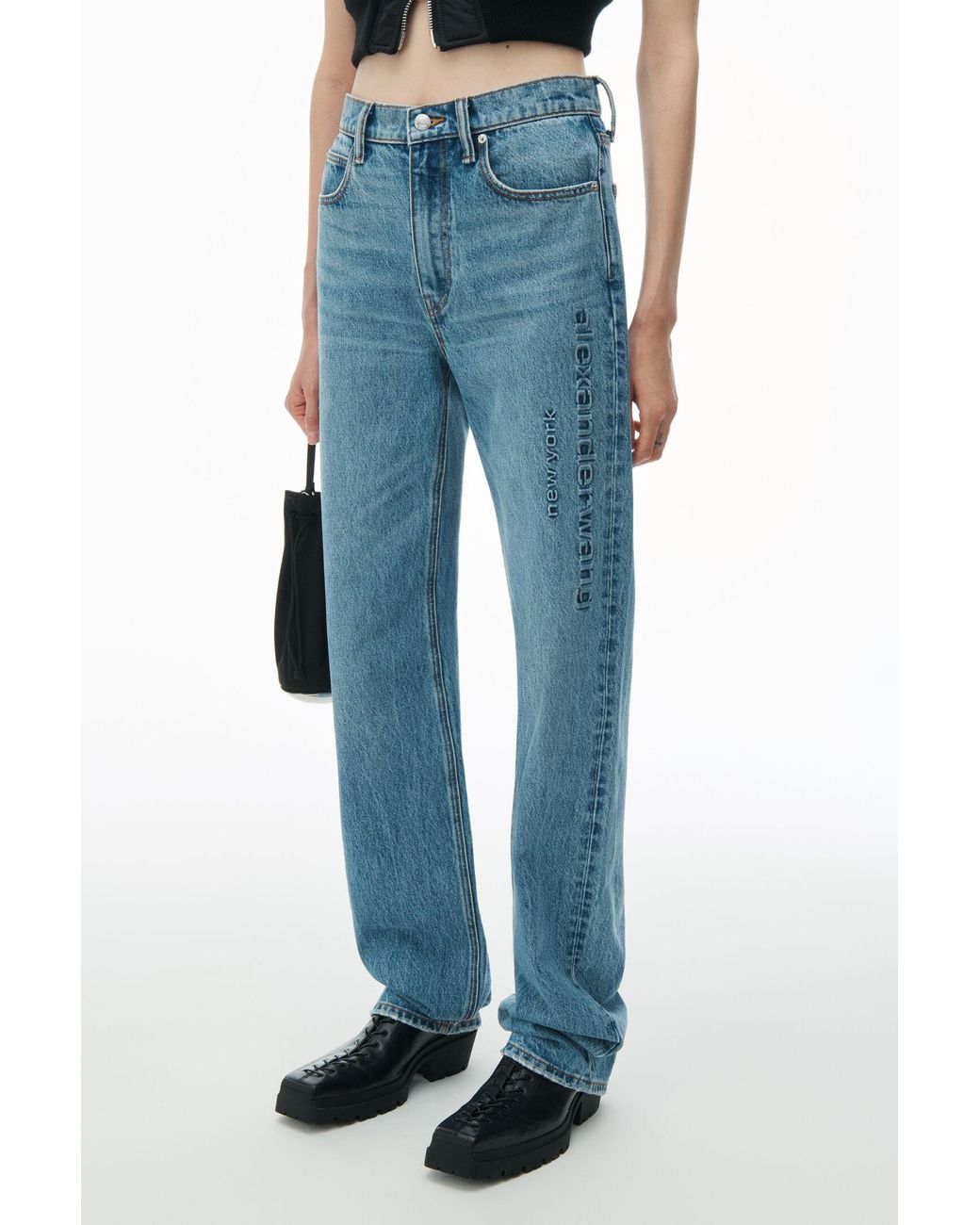 Alexander Wang Ez Mid Rise Jeans With Embossed Logo in Blue