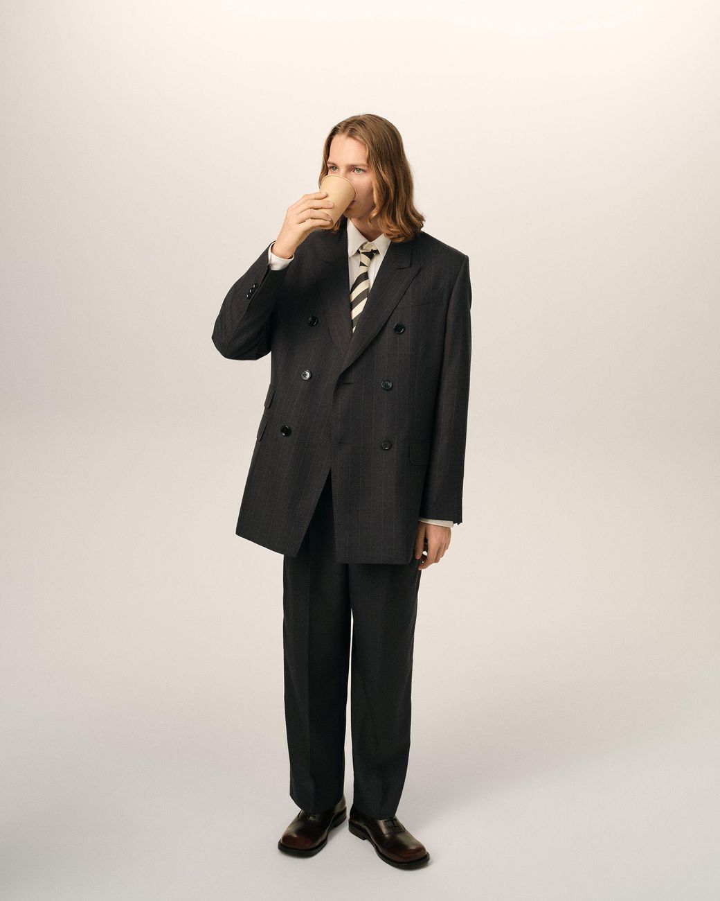 AMI Black High-Waisted Carrot-Fit Striped Wool Trousers for men