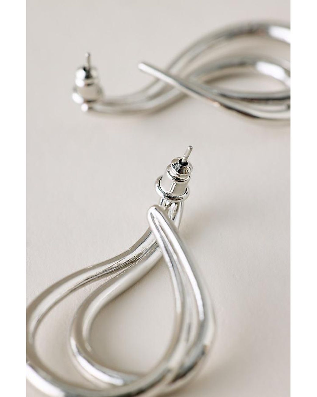 By Anthropologie Metallic Double Teardrop Earrings