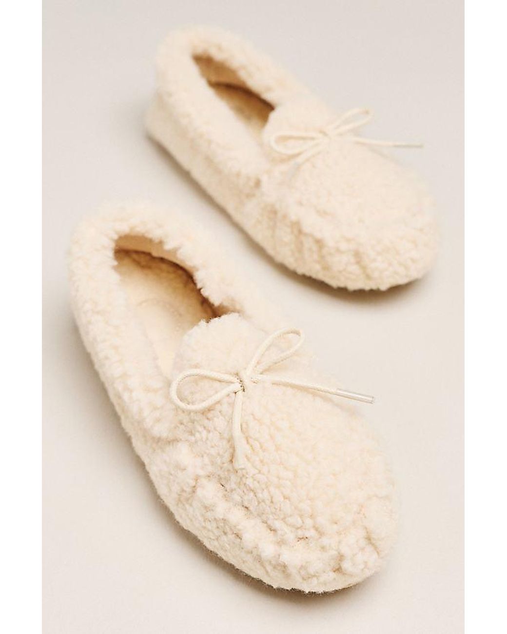 By Anthropologie Natural Sherpa Moccasin Slippers