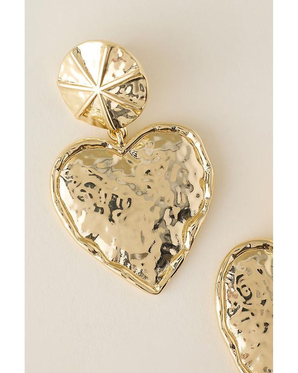 By Anthropologie Metallic Hammered Heart Drop Earrings