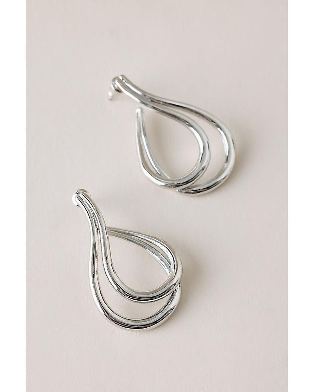 By Anthropologie Metallic Double Teardrop Earrings
