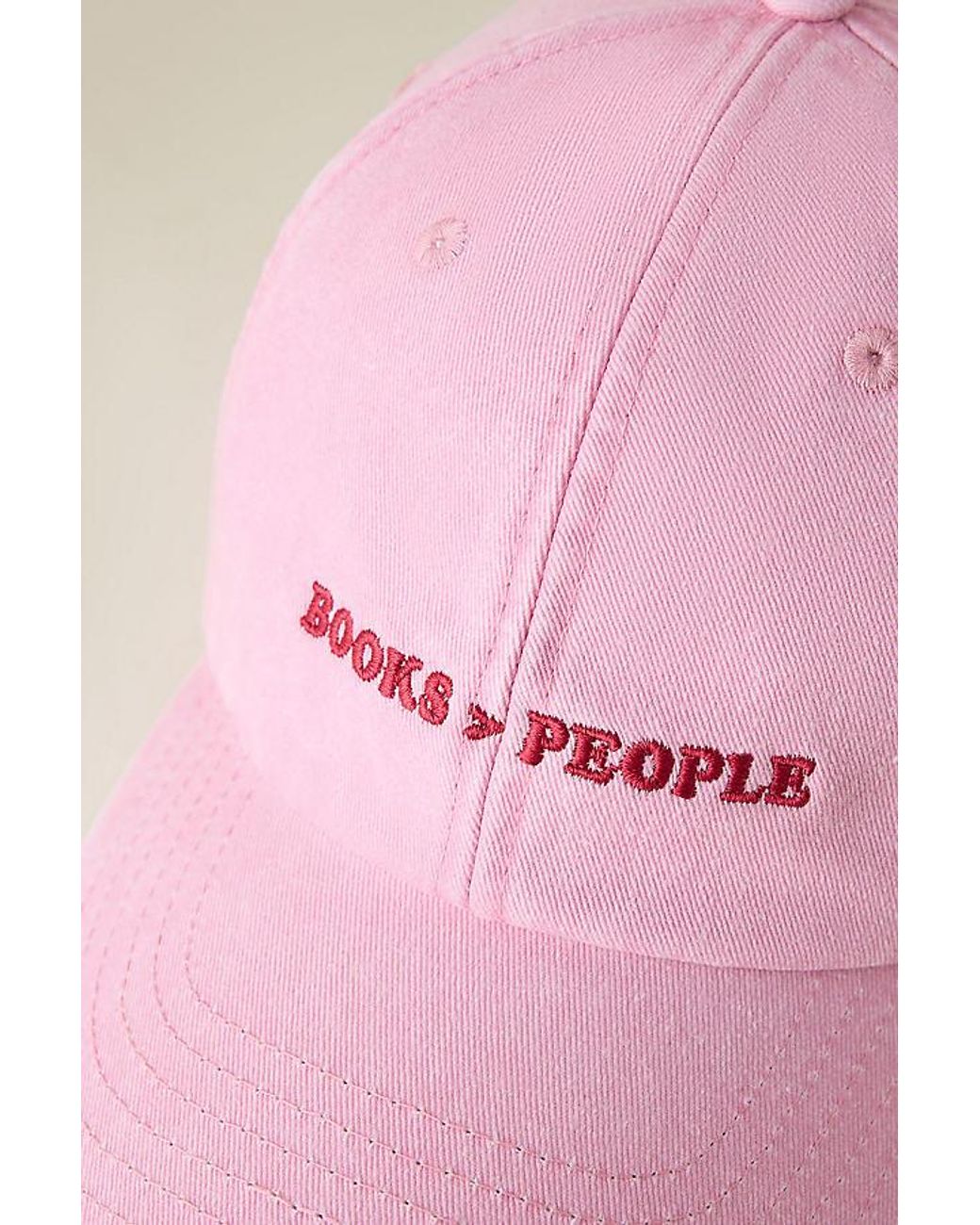 By Anthropologie Pink Books Over People Embroidered Baseball Cap