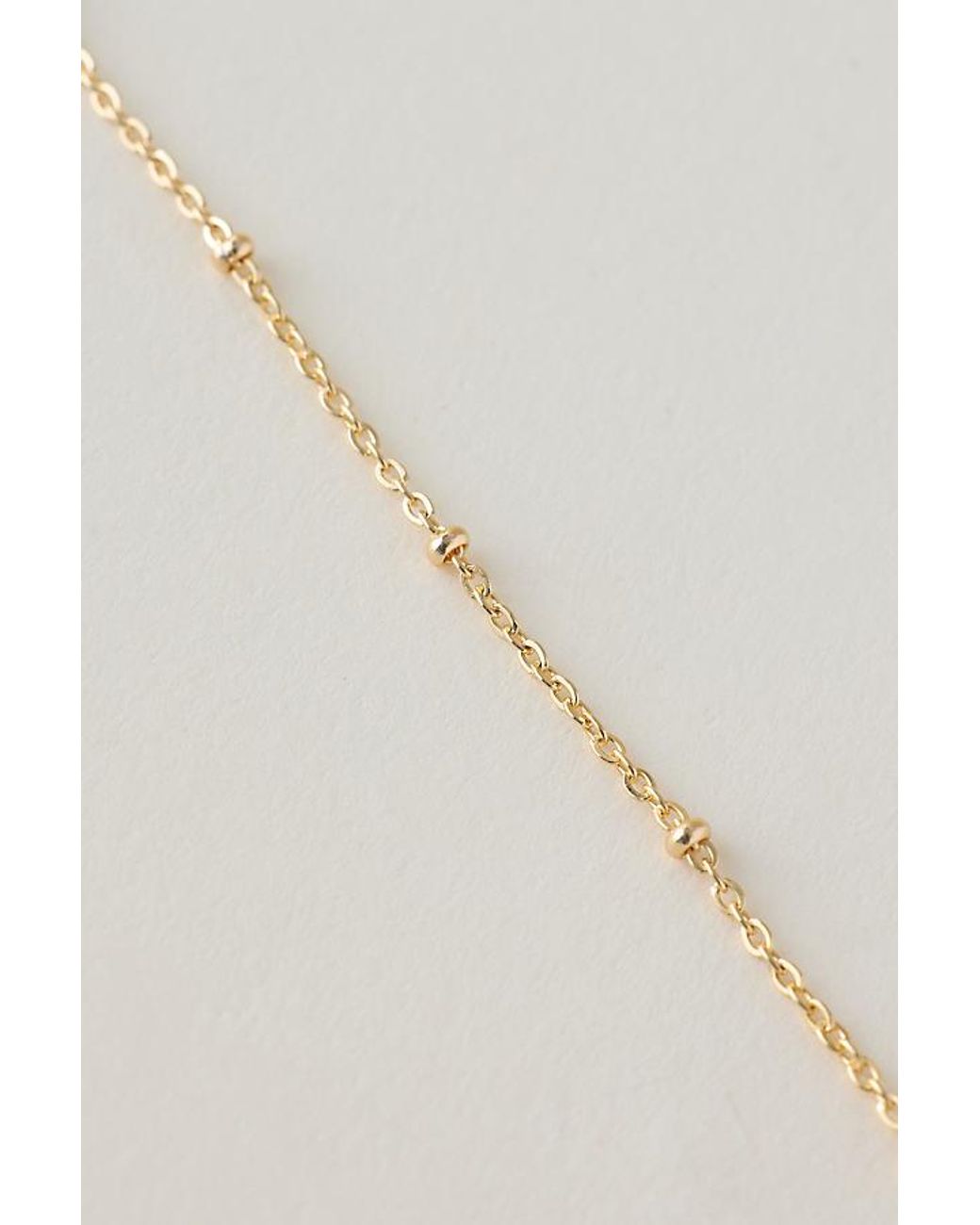 By Anthropologie Natural Water-Resistant Dainty Beaded Bracelet