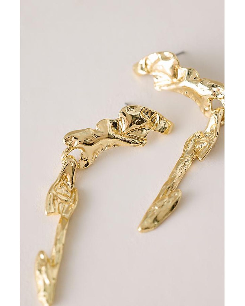 By Anthropologie Natural Mottled Drop Earrings