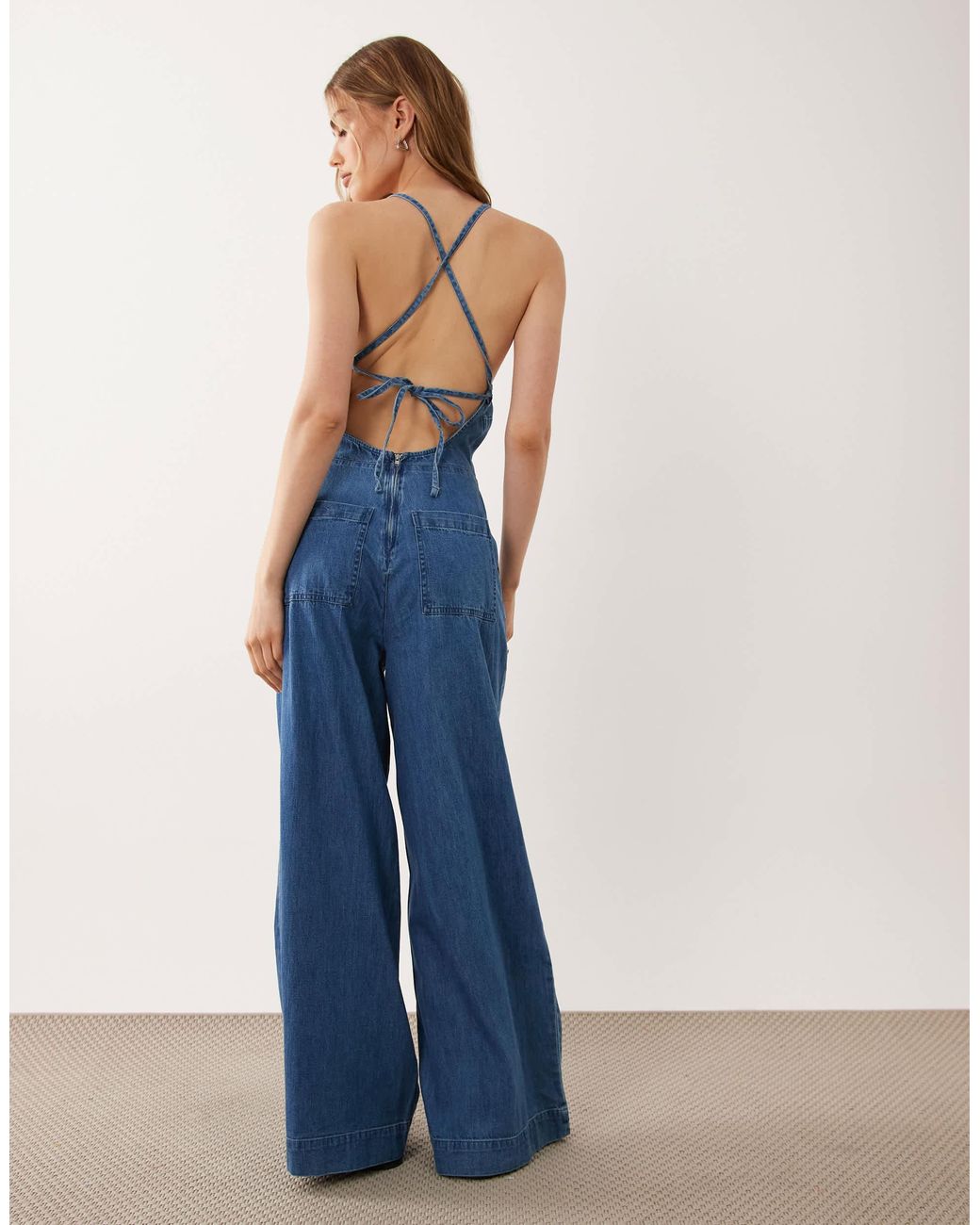 ASOS Blue Halter Neck Denim Jumpsuit With Patch Pockets
