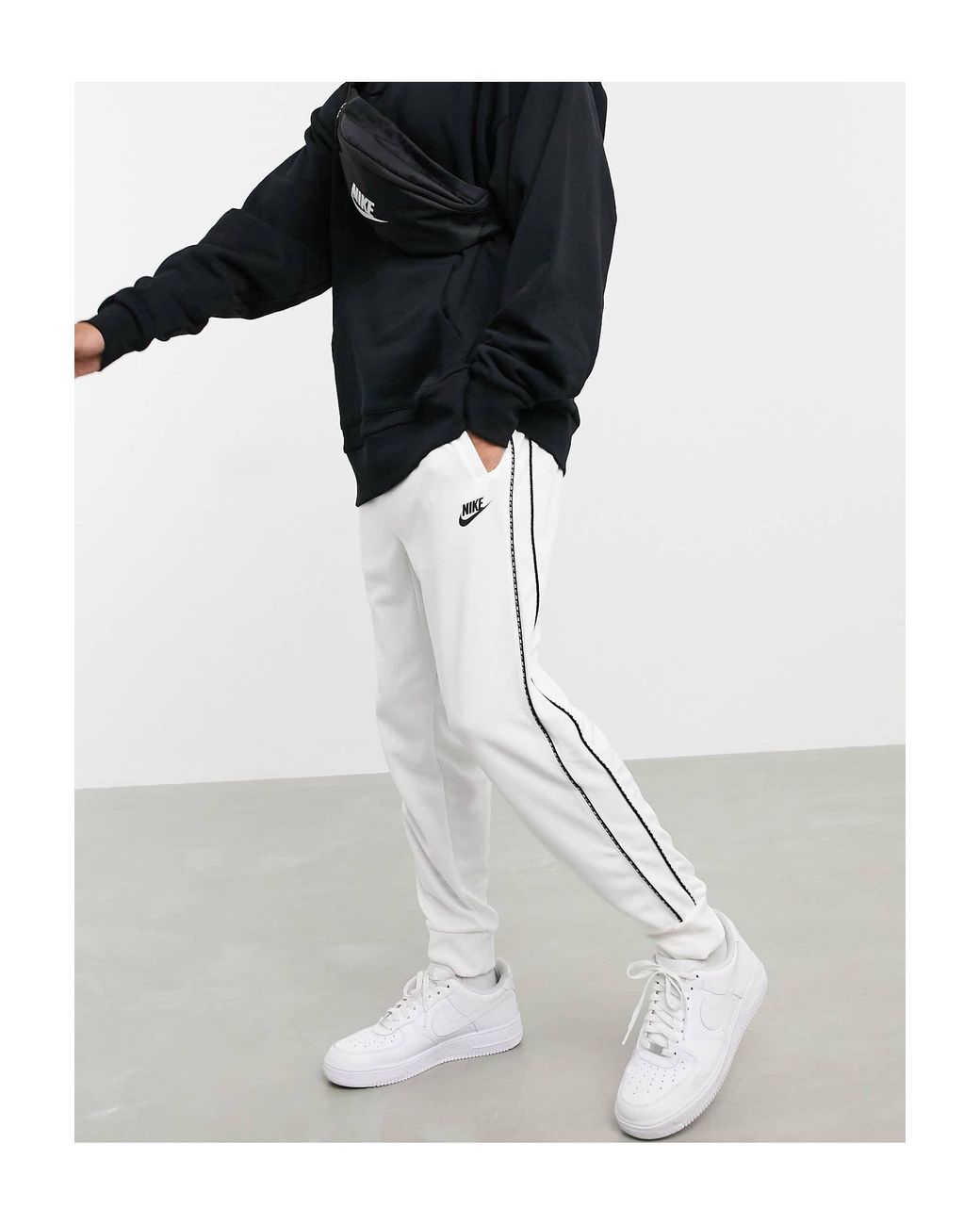 Nike Repeat Pack Polyknit Logo Taping Cuffed joggers in White for Men |  Lyst Australia