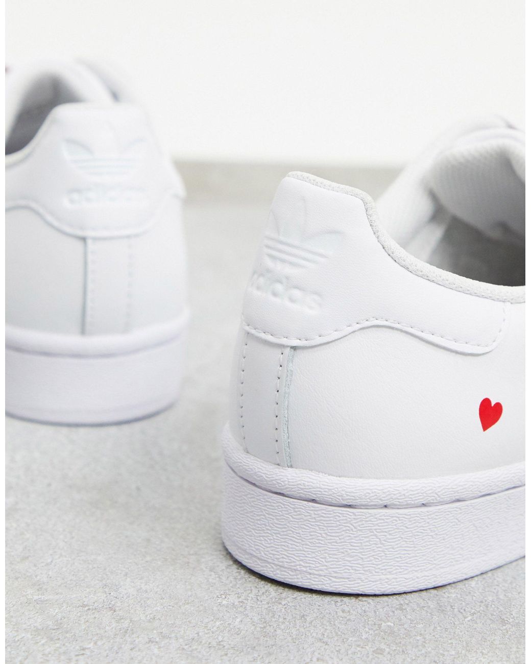 adidas originals superstar trainers with heart print in white