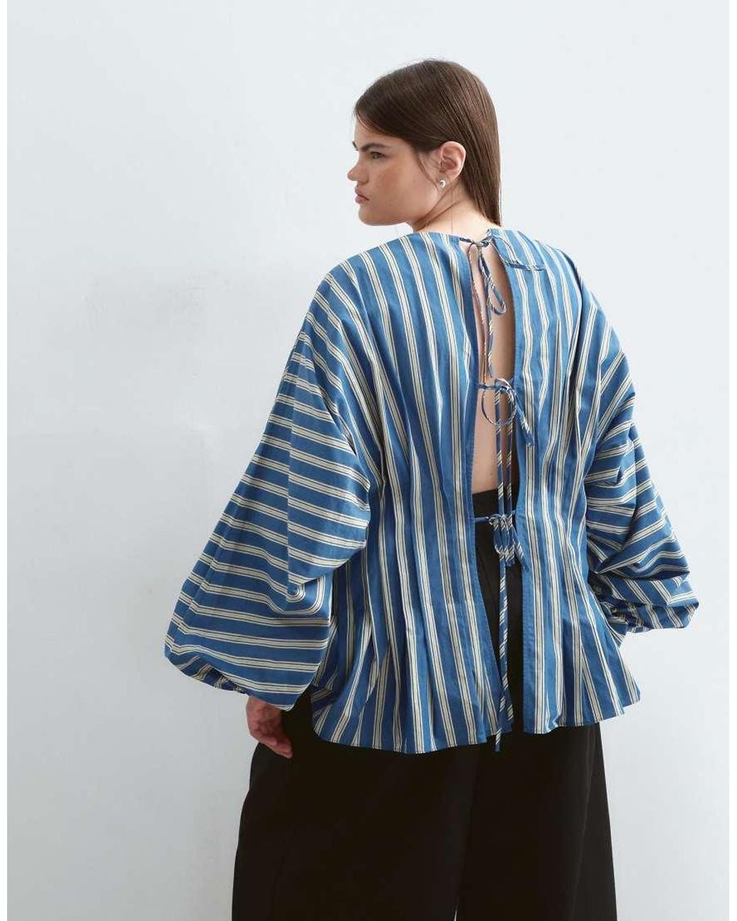 ARRANGE Blue Curve Volume Sleeve Pleated Cinched Waist Top