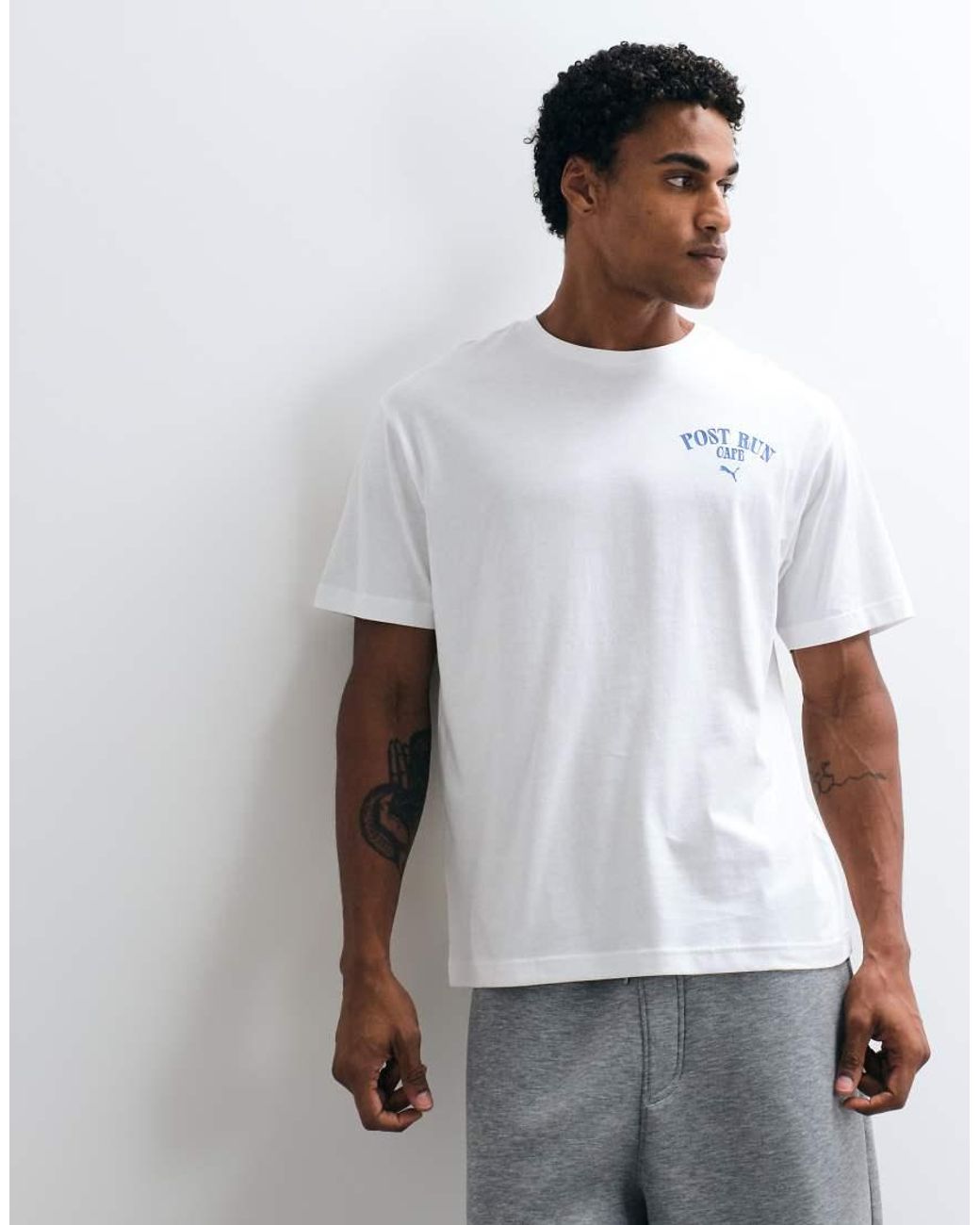 PUMA White Graphic Cafe Relaxed Tee for men