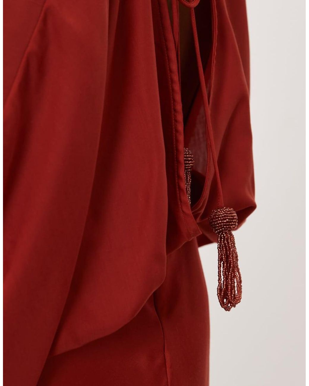 ASOS Red Asos Design Petite Cape Sleeve Open Back Mini Dress With Tassels