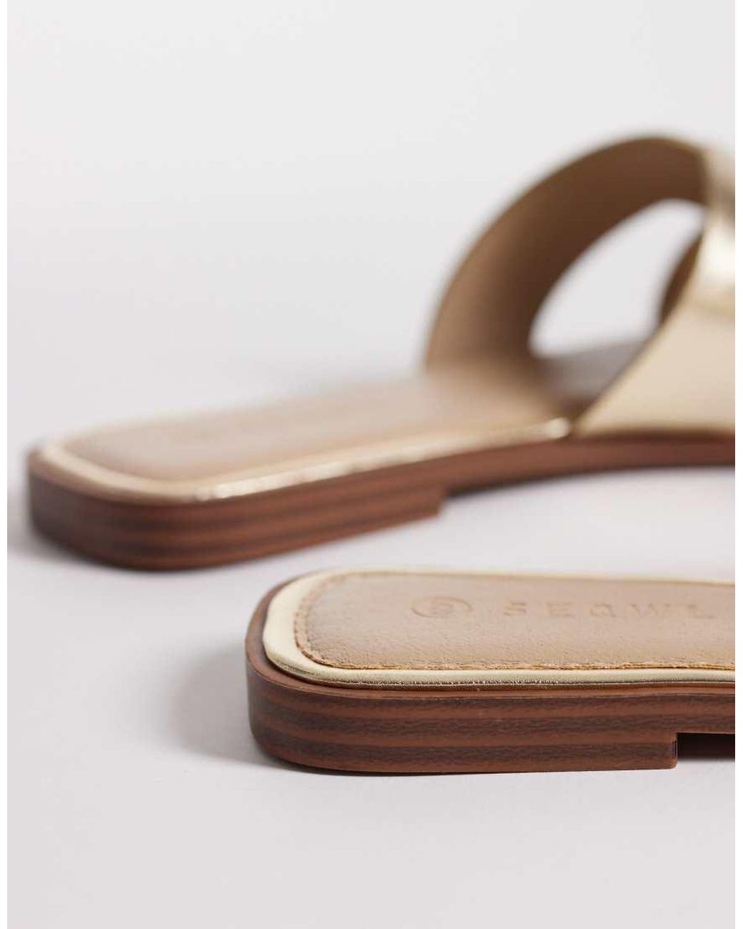 SEQWL White Storke Flat Sandals