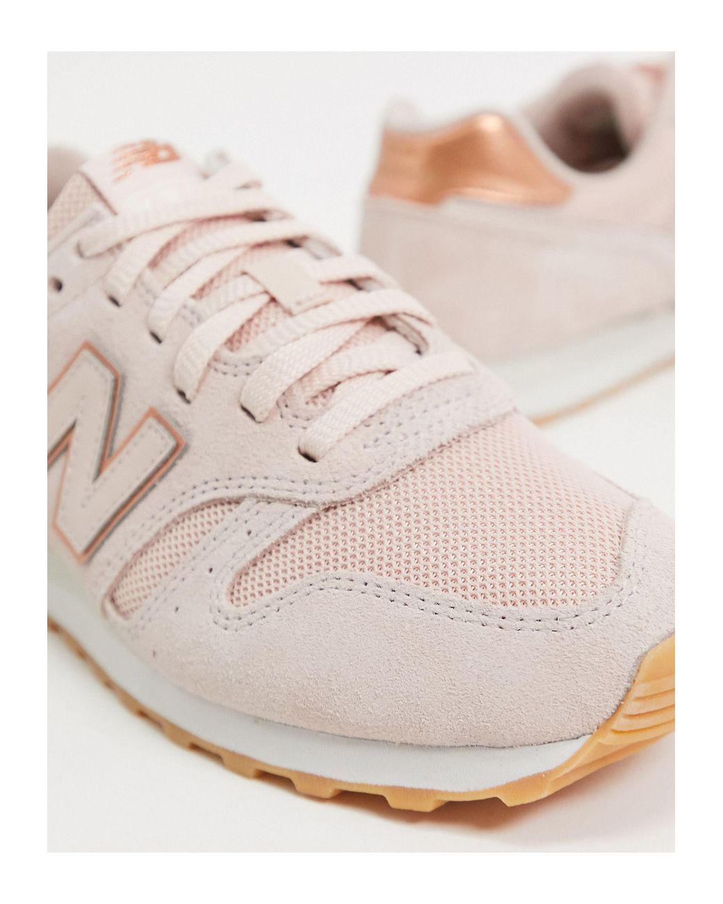 Hacer un nombre basura bomba New Balance 373 Womens Pink / Rose Gold Trainers | Lyst