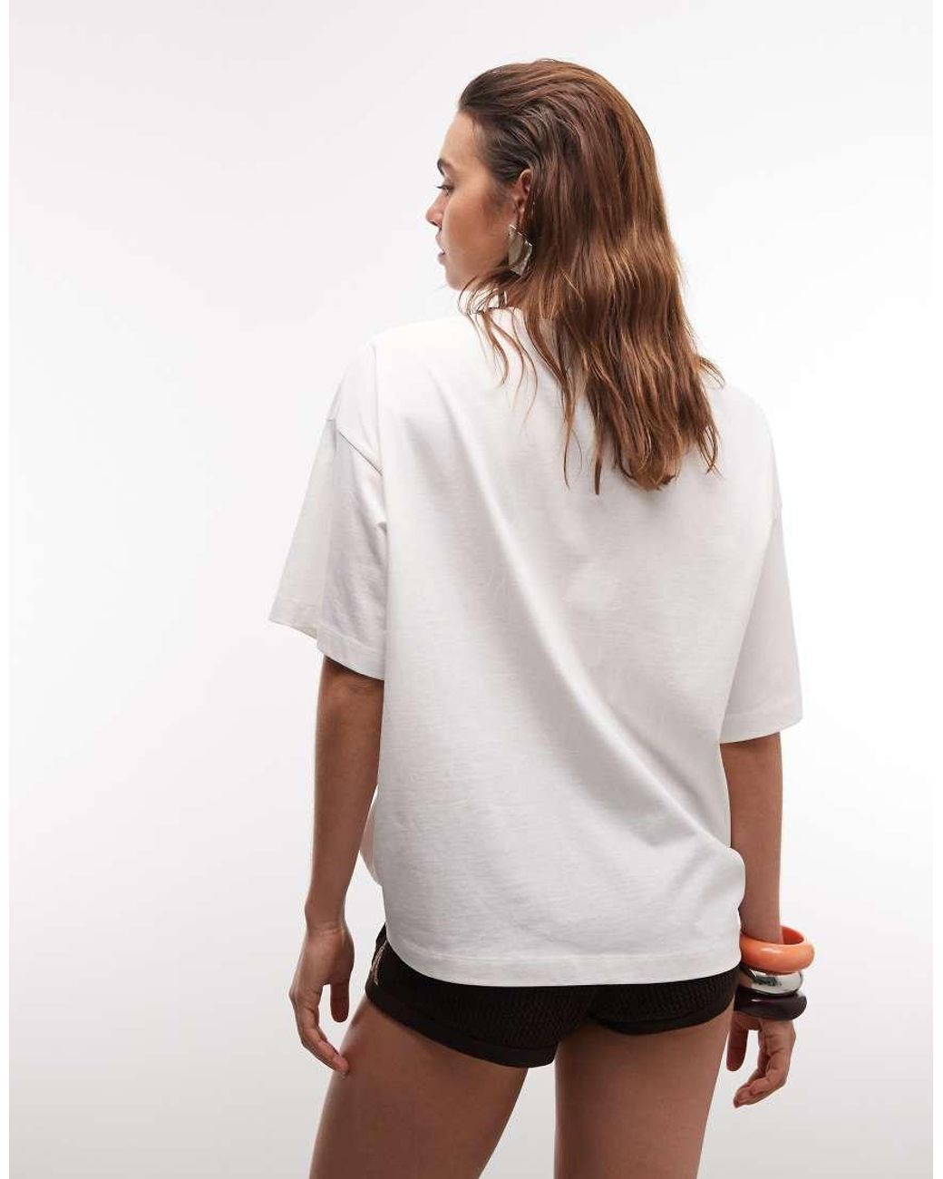 The Frolic White Exclusive Sun Lounger Graphic Front Oversized T-shirt