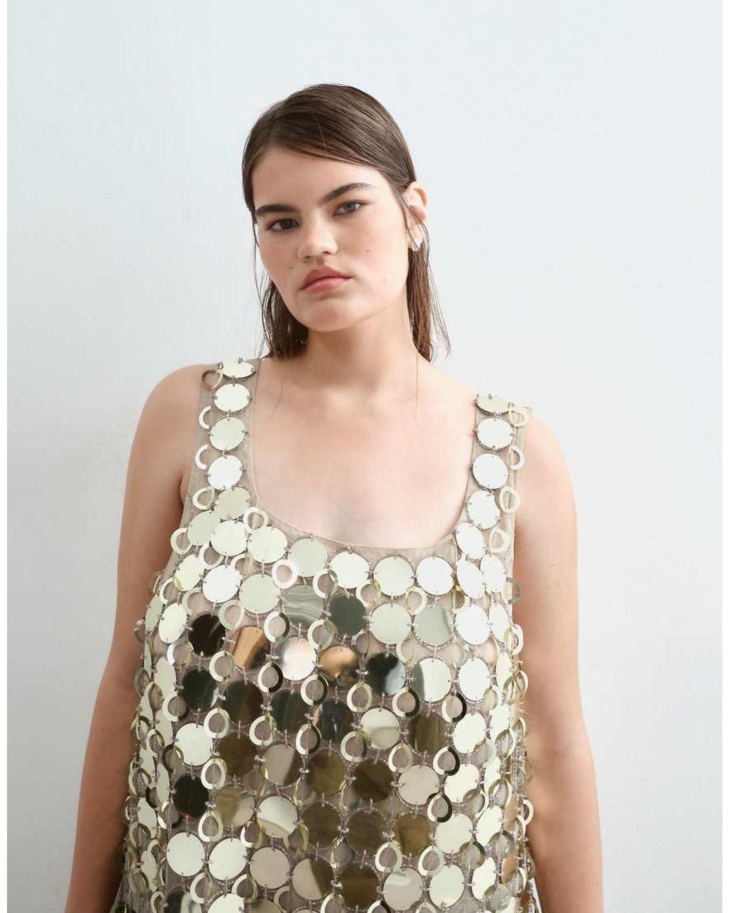 ARRANGE Metallic Curve Futurist Sequin Crop Top With Long 3D Fringe Hem
