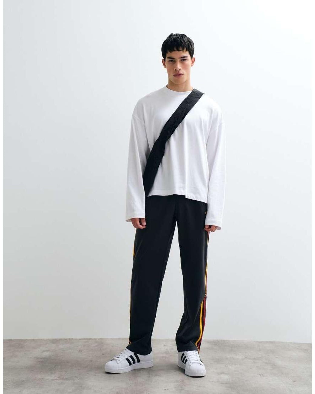 Adidas Originals Black Firebird Track Pants for men