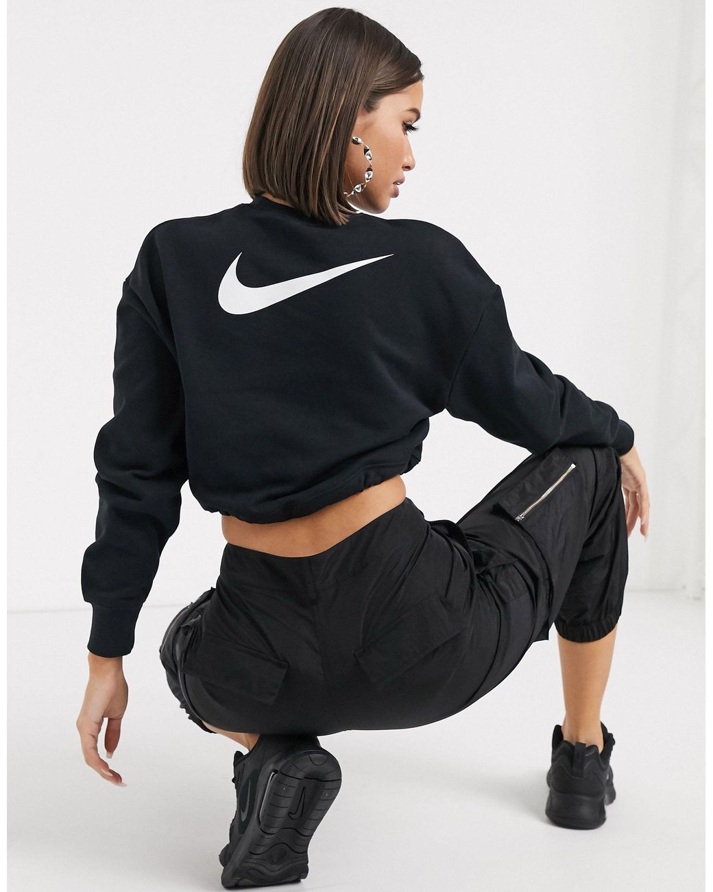 Nike Elastic Drawcord Cropped Mini Swoosh Sweatshirt in Black | Lyst