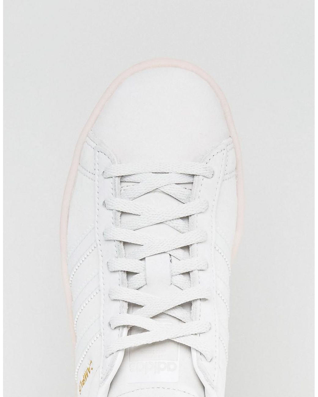 adidas white shoes with pink stripes