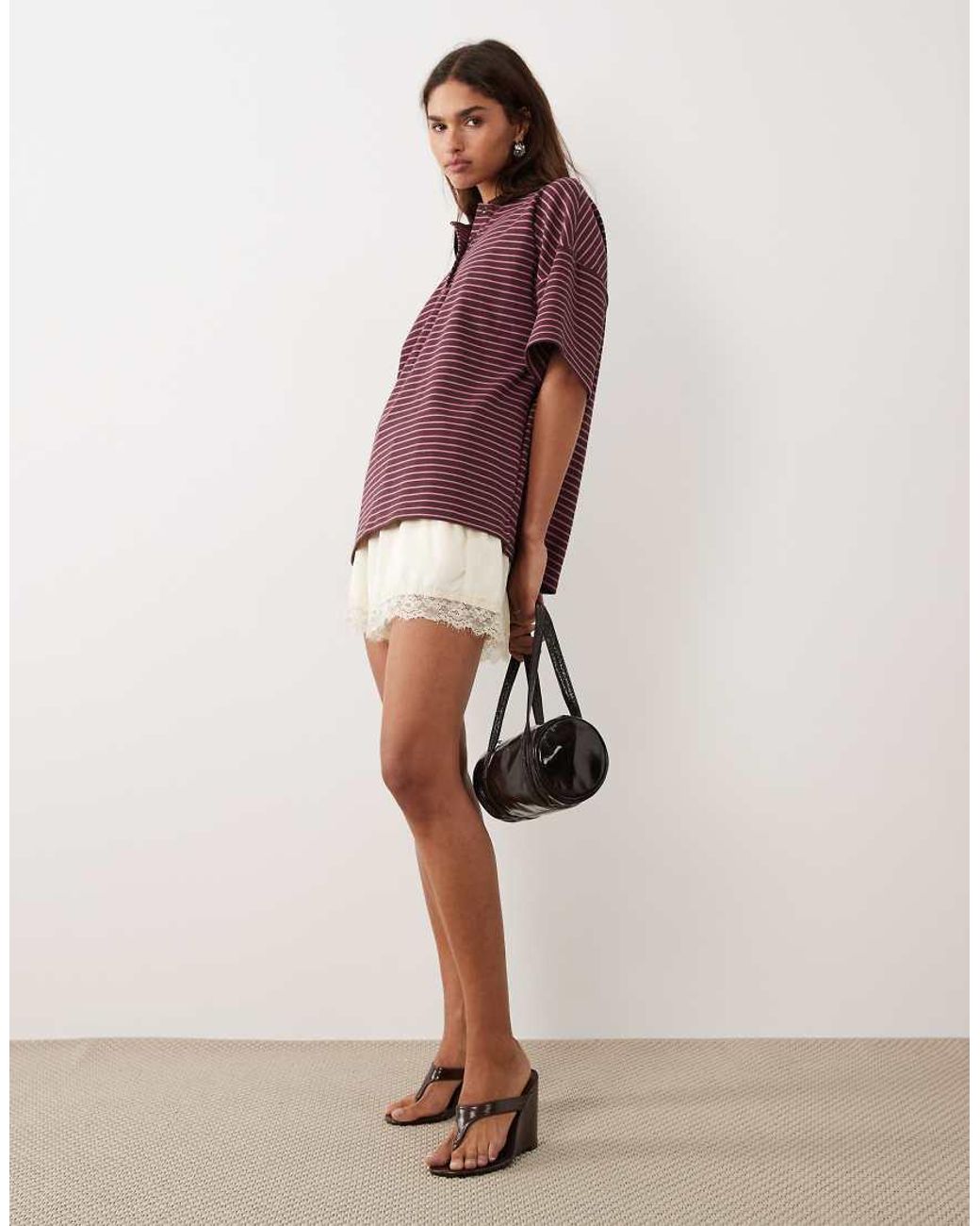 BRONZE SNAKE Purple Nelly Striped Polo Top