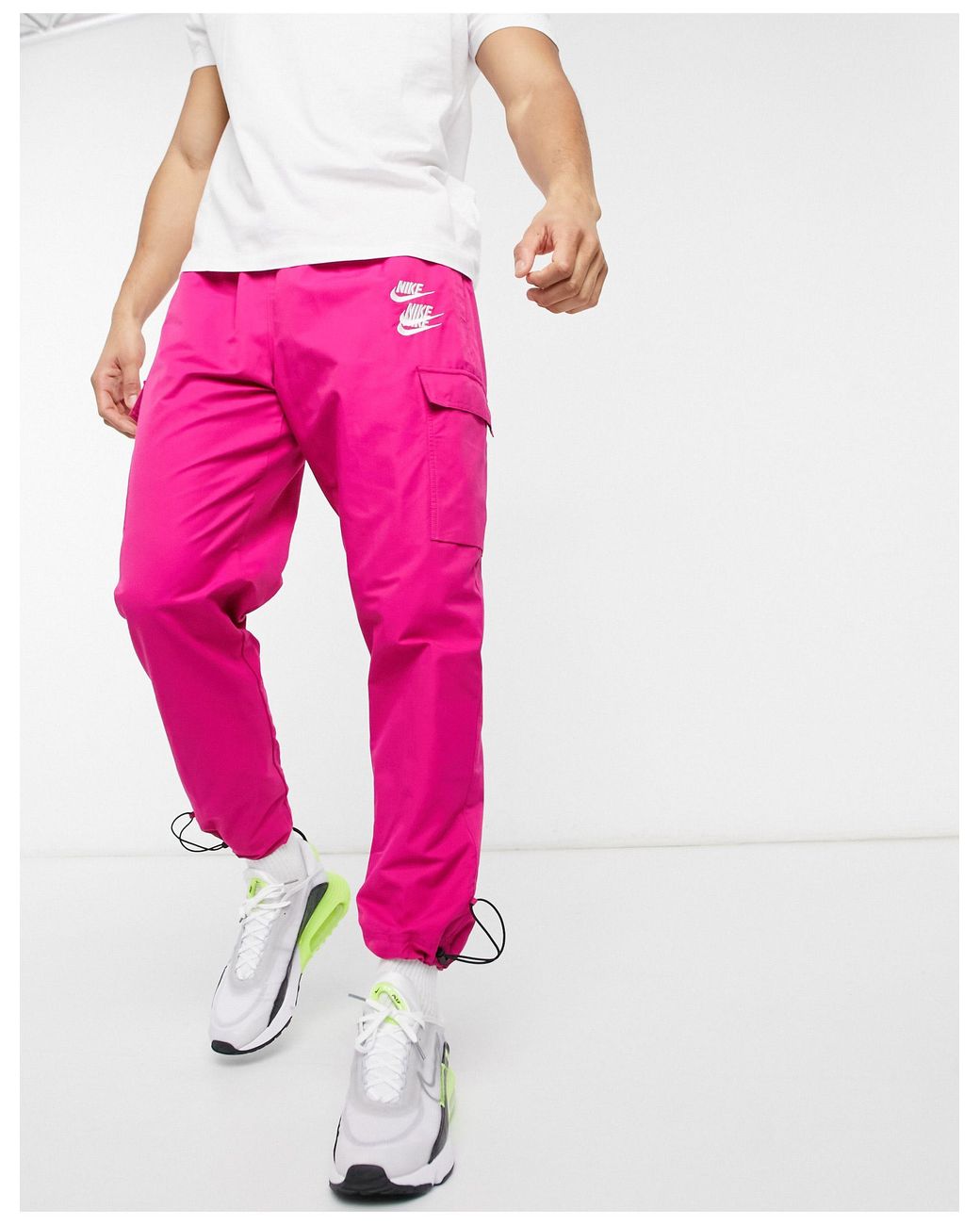 World tour pack - jogger à chevilles resserrées, poches cargo et imprimé  graphique Nike pour homme en coloris Rose | Lyst