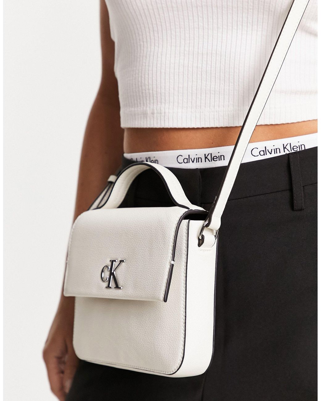 Calvin Klein Monogram Logo Cross Body Bag in White | Lyst