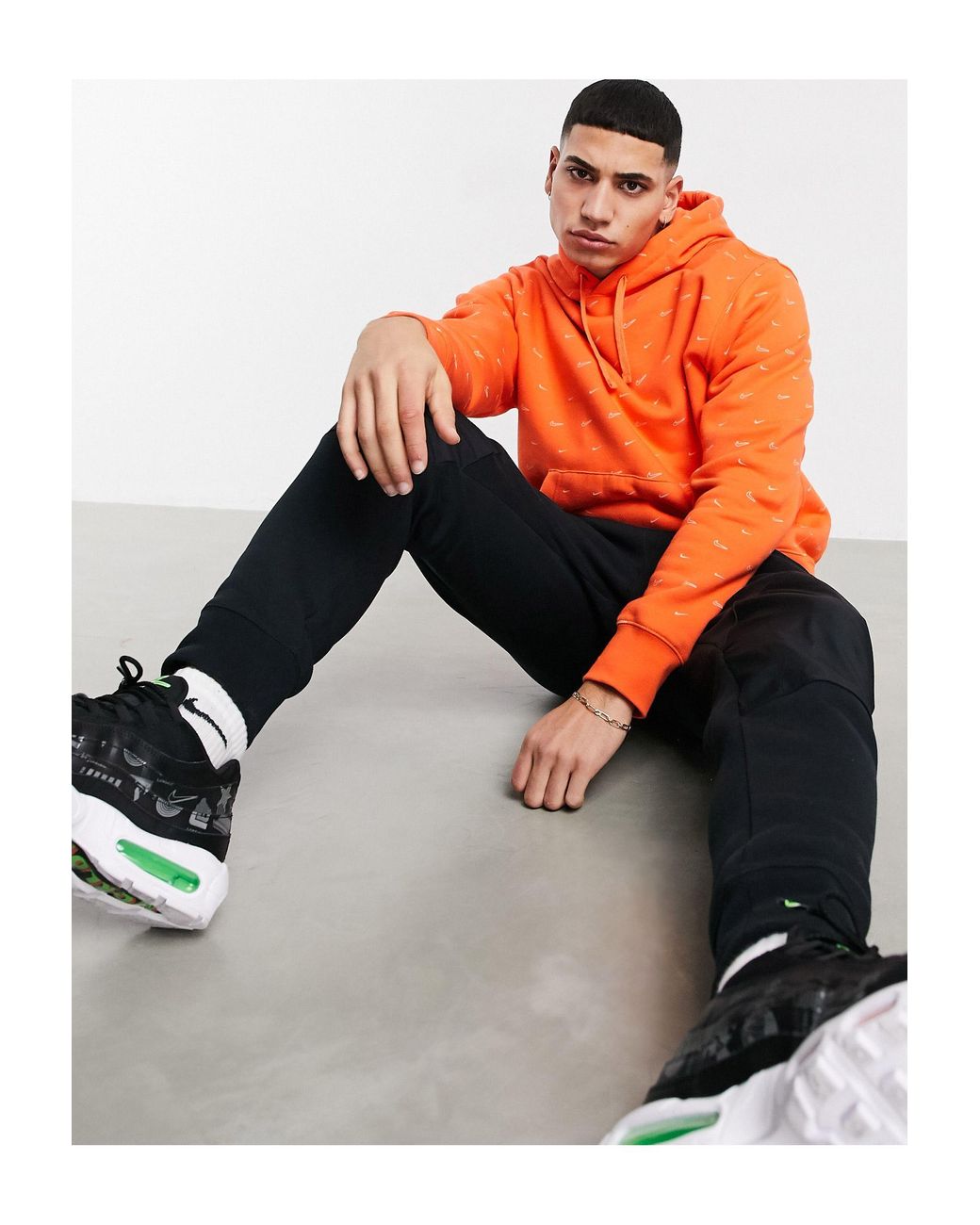 Nike All-over Swoosh Print Hoodie in Orange for Men | Lyst
