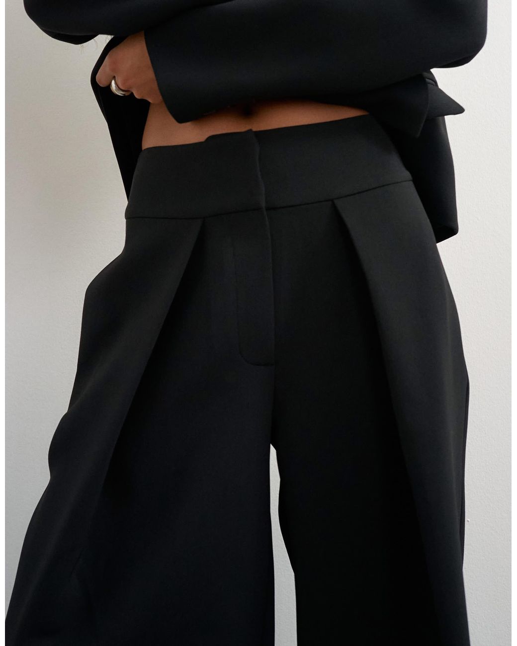Pantalon large à pli devant TOPSHOP en coloris Black