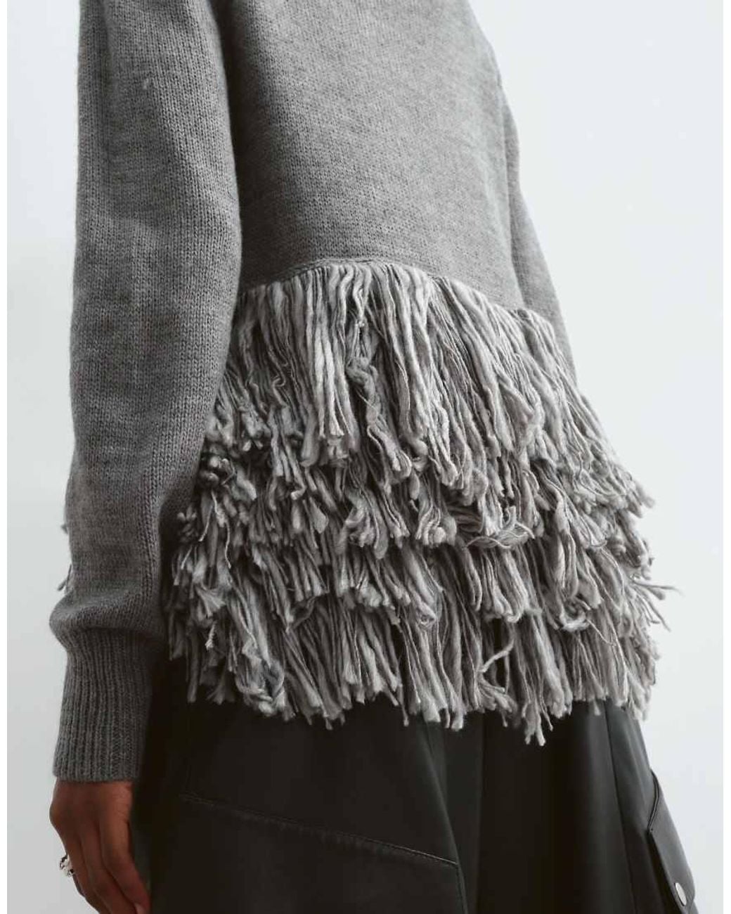 ARRANGE Gray Knitted Sweater With Fringe Hem