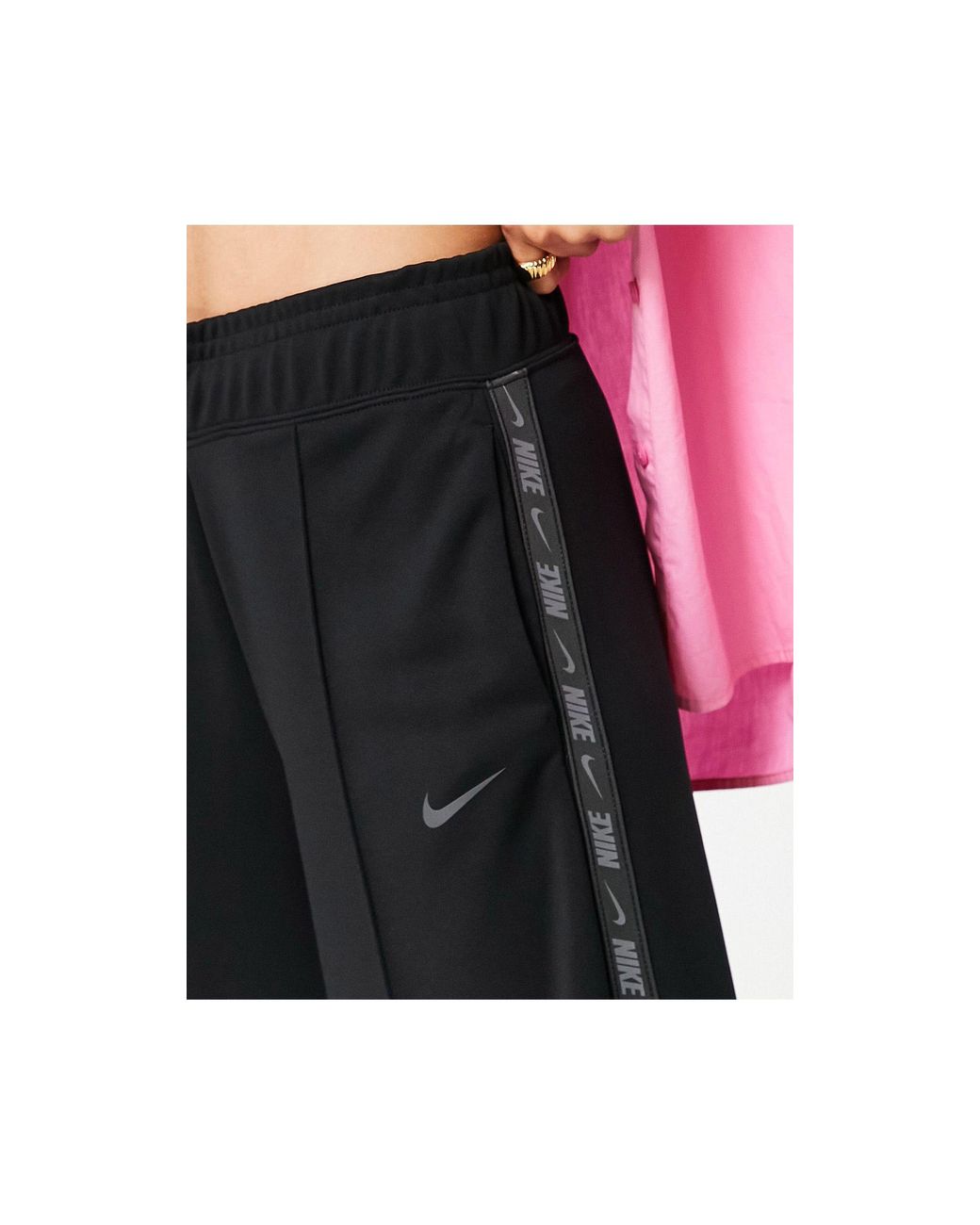 Nike Swoosh Tape Wide Leg joggers in Black | Lyst