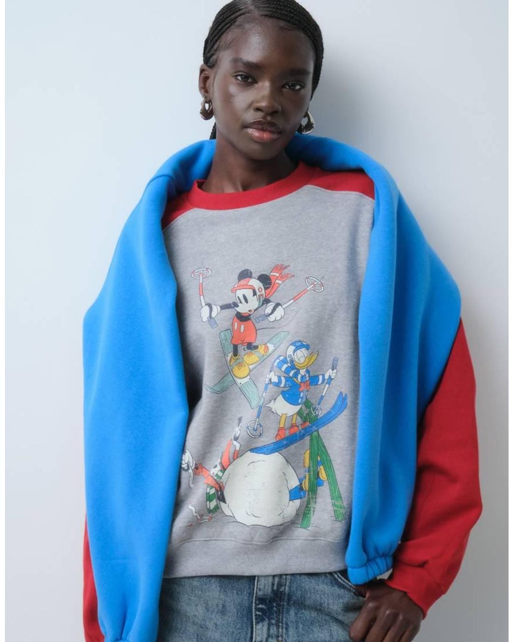 ASOS Red Disney Sweatshirt With Mickey And Friends Ski Print With Pleat Sleeve Detail