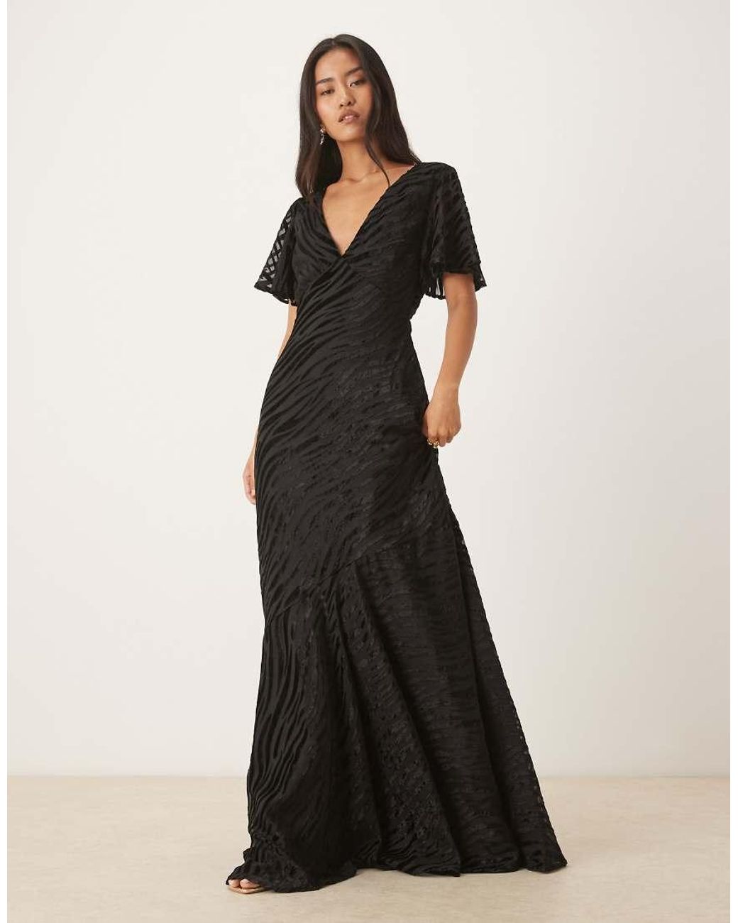 Six Stories Black Flutter Sleeve V-neck Asymmetric Dropped Hem Maxi Dress