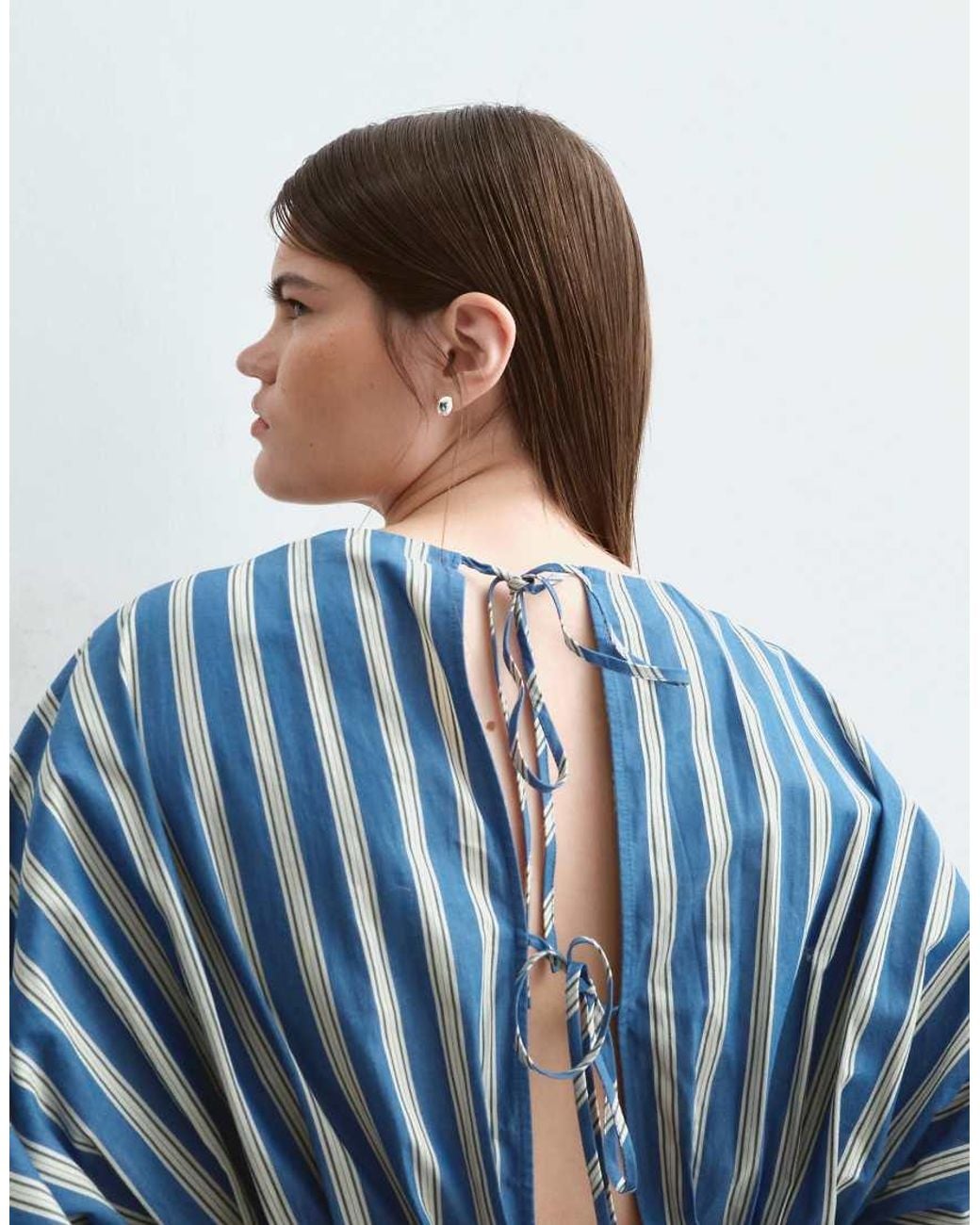 ARRANGE Blue Curve Volume Sleeve Pleated Cinched Waist Top