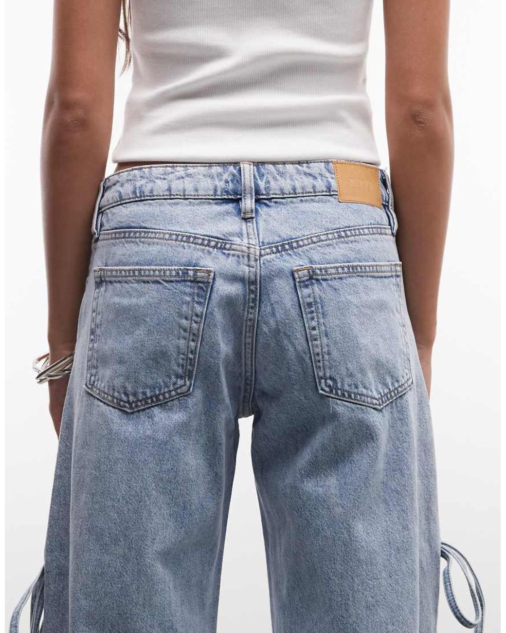 Monki Blue Low Waist Wide Leg Jeans With Side Tie Bow Detail