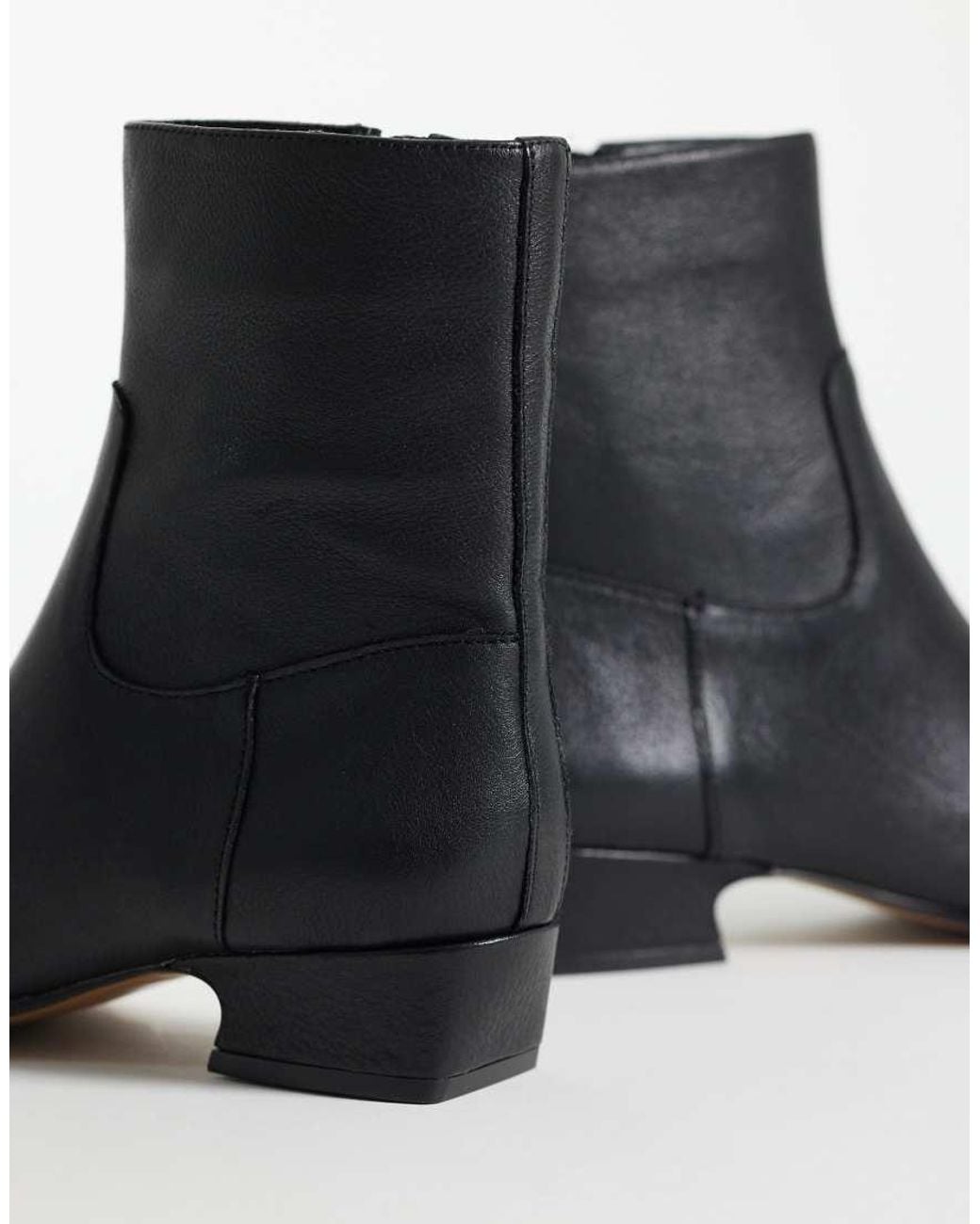 Steve Madden Black Dusty Flat Mid Ankle Boots