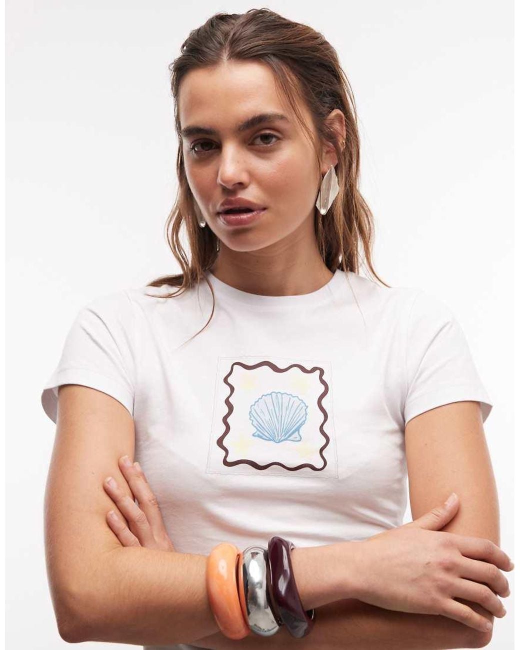 The Frolic Brown Exclusive Shell Graphic Front Baby Tee