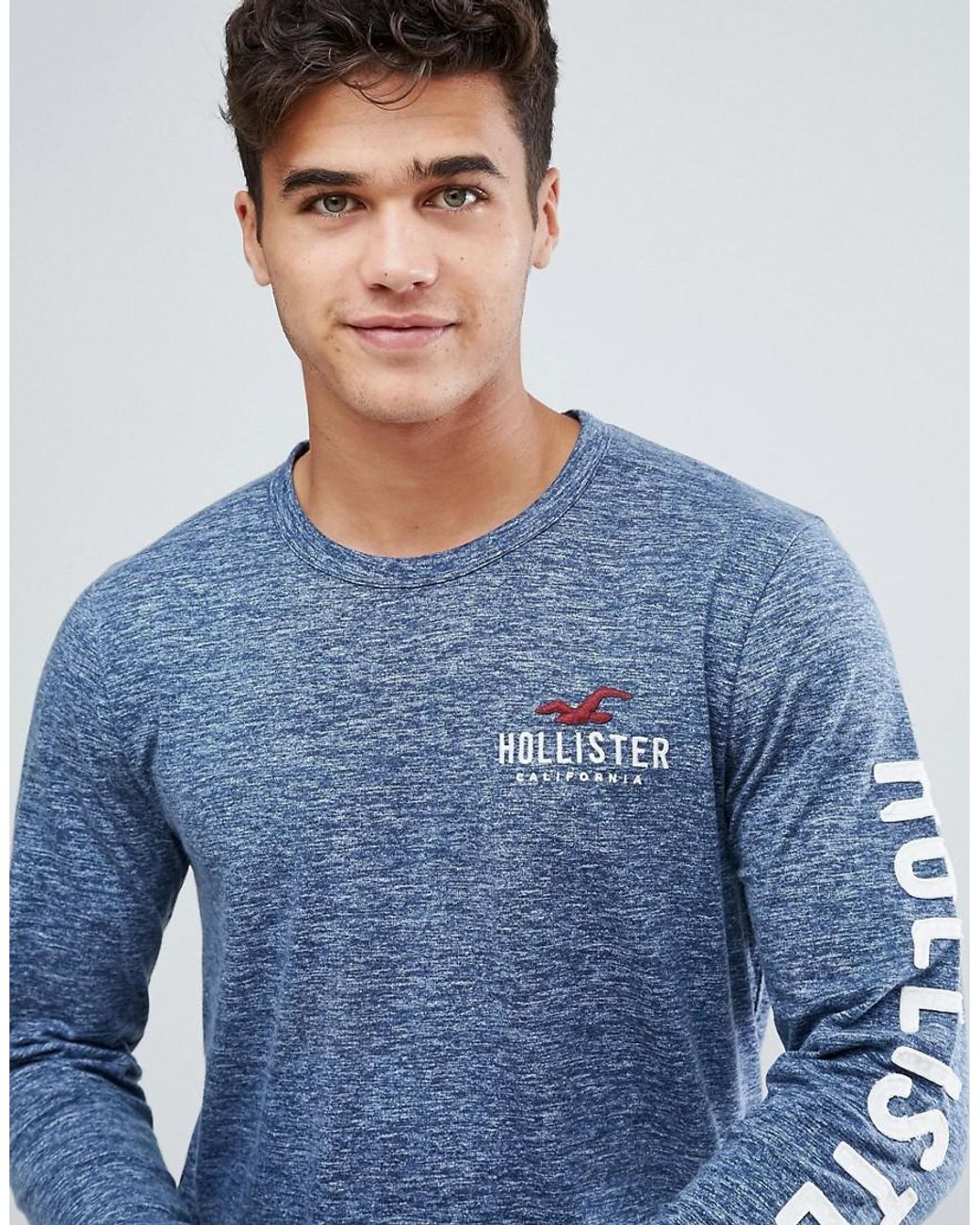 Hollister Long Sleeve Top Tech Logo Sleeve Print In Navy in Blue