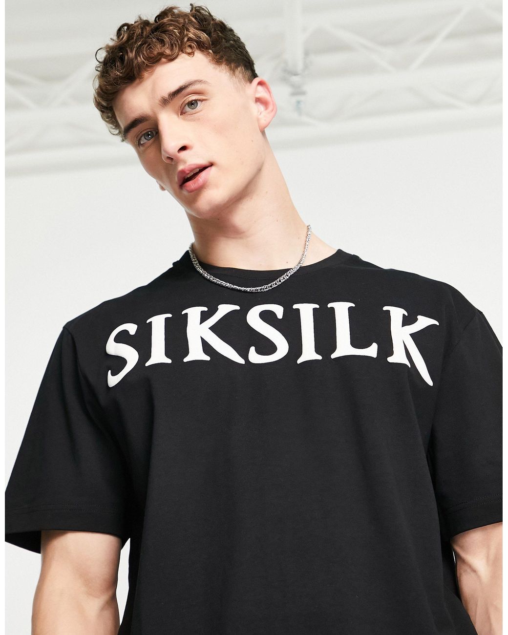 Camiseta negra extragrande con logo estampado en el pecho SIKSILK de hombre  de color Negro | Lyst