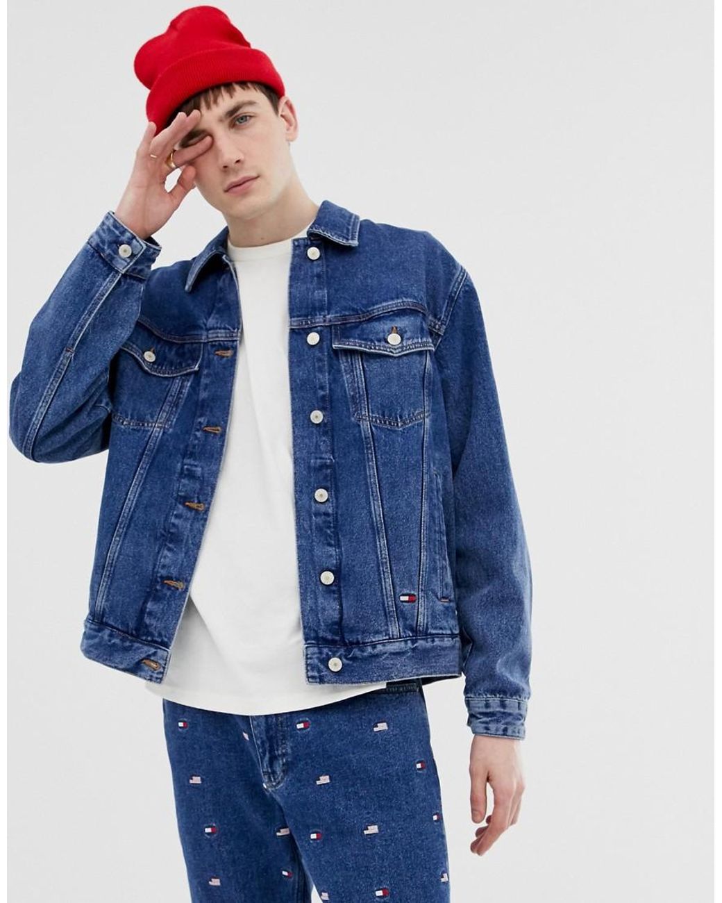 Tommy Jeans flag print oversized denim trucker jacket in mid wash