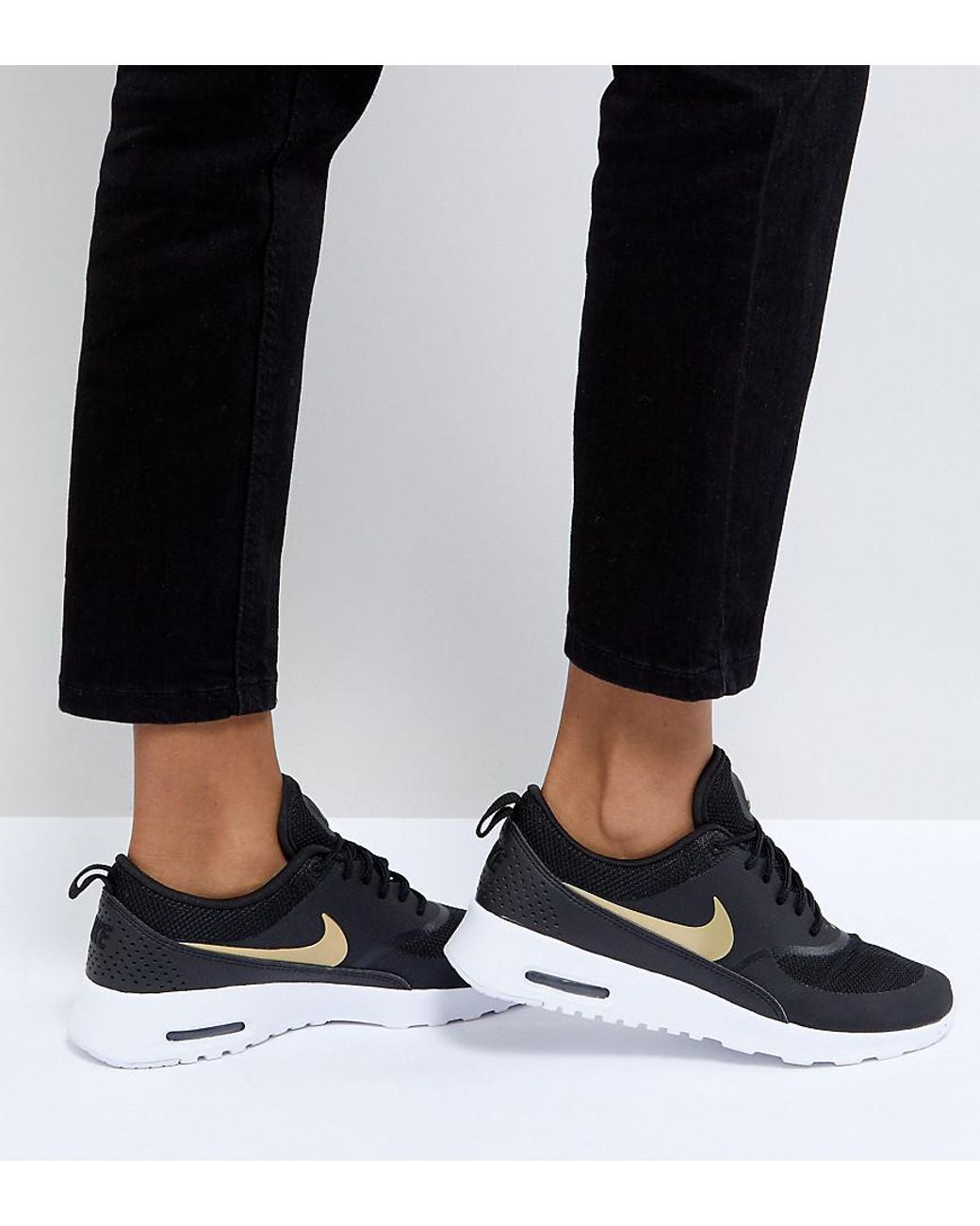 Nike Air Thea Trainers In And Gold Lyst