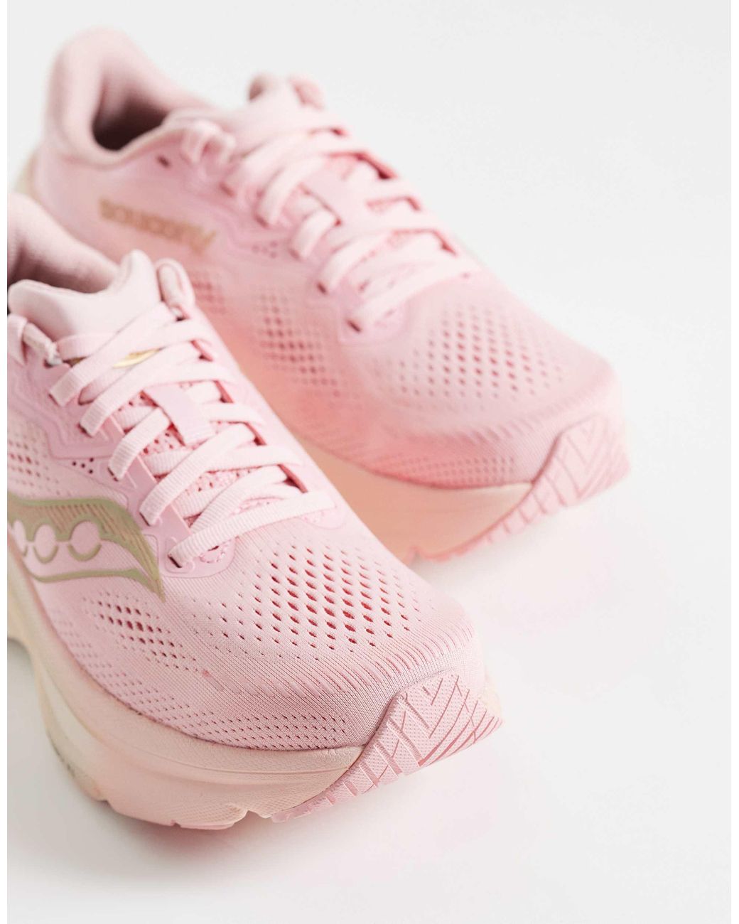 Guide 19 baskets clair Saucony en coloris Pink