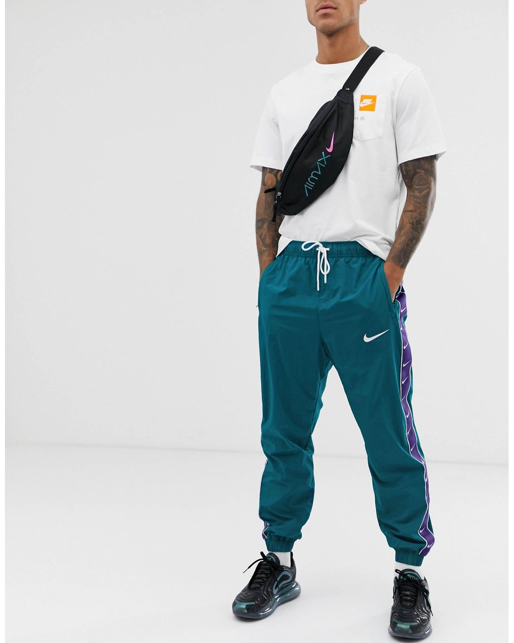 Pantalones Nike hombre de color Verde