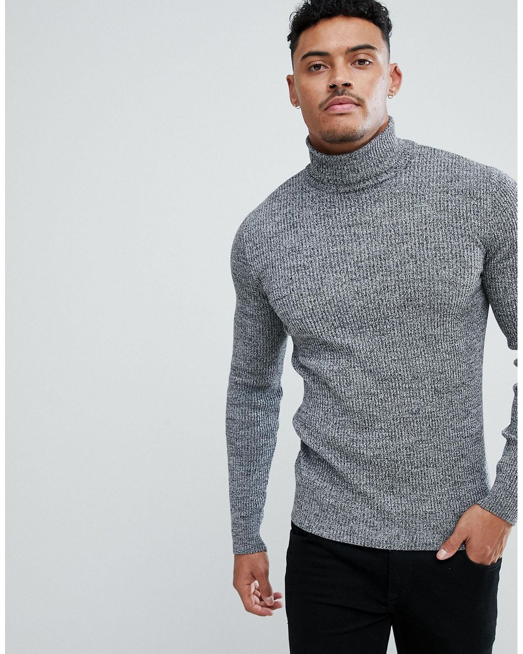white ribbed roll neck jumper