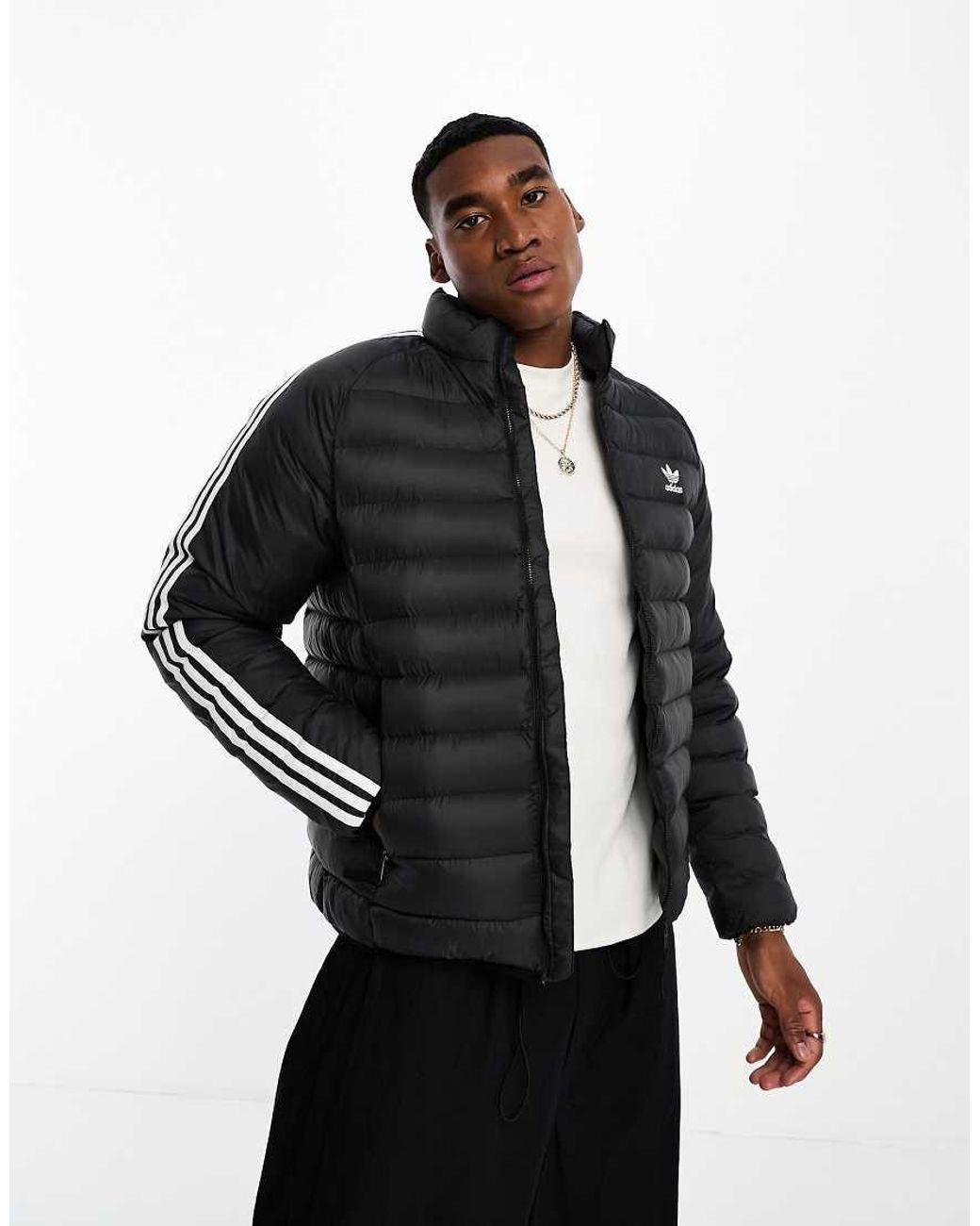 Chaqueta adidas negra rayas blancas sale