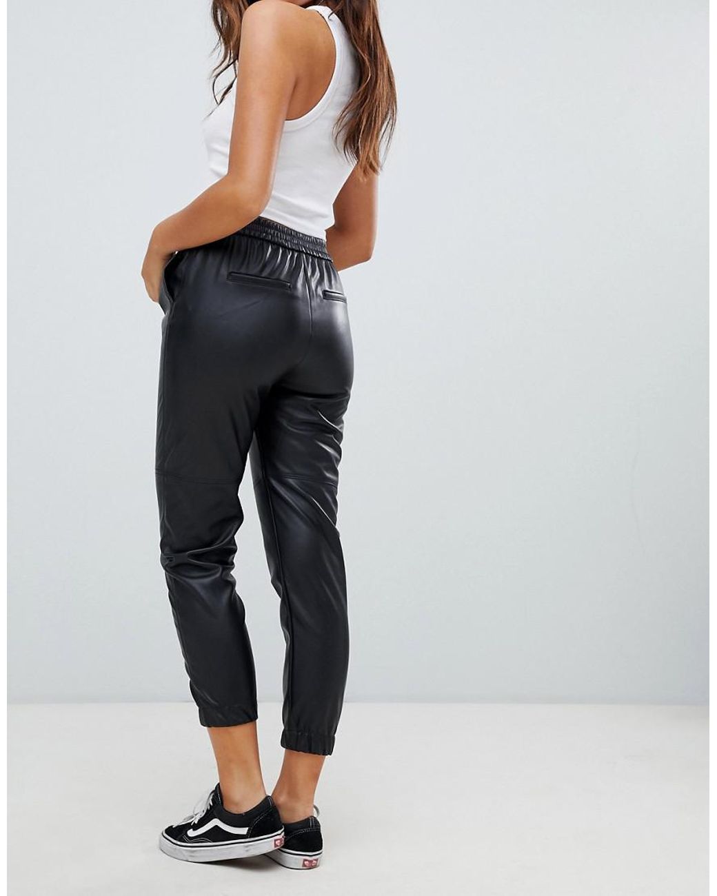 Bershka Denim Button Front Faux Leather Trousers in Black | Lyst
