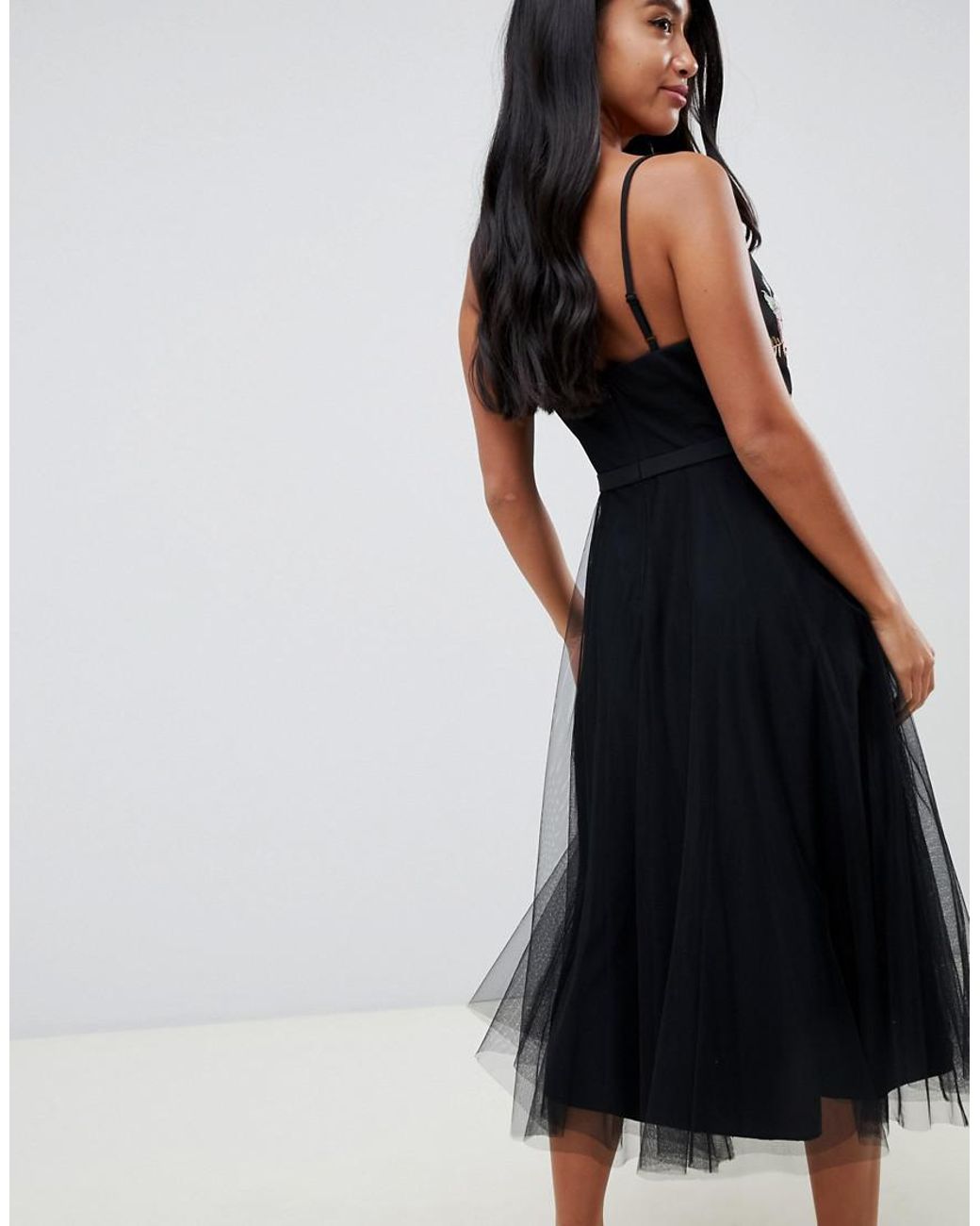 little mistress foil print mini dress with pleated skirt in black multi